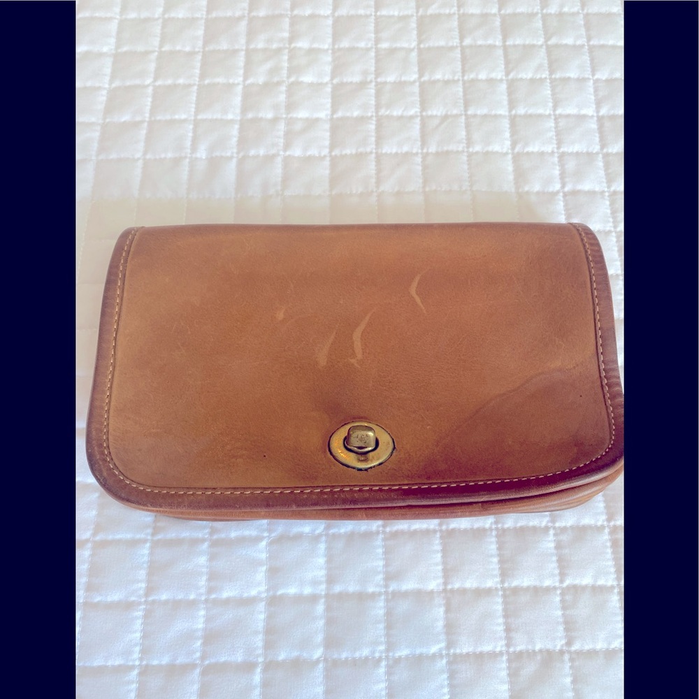 Coach tan leather clutch